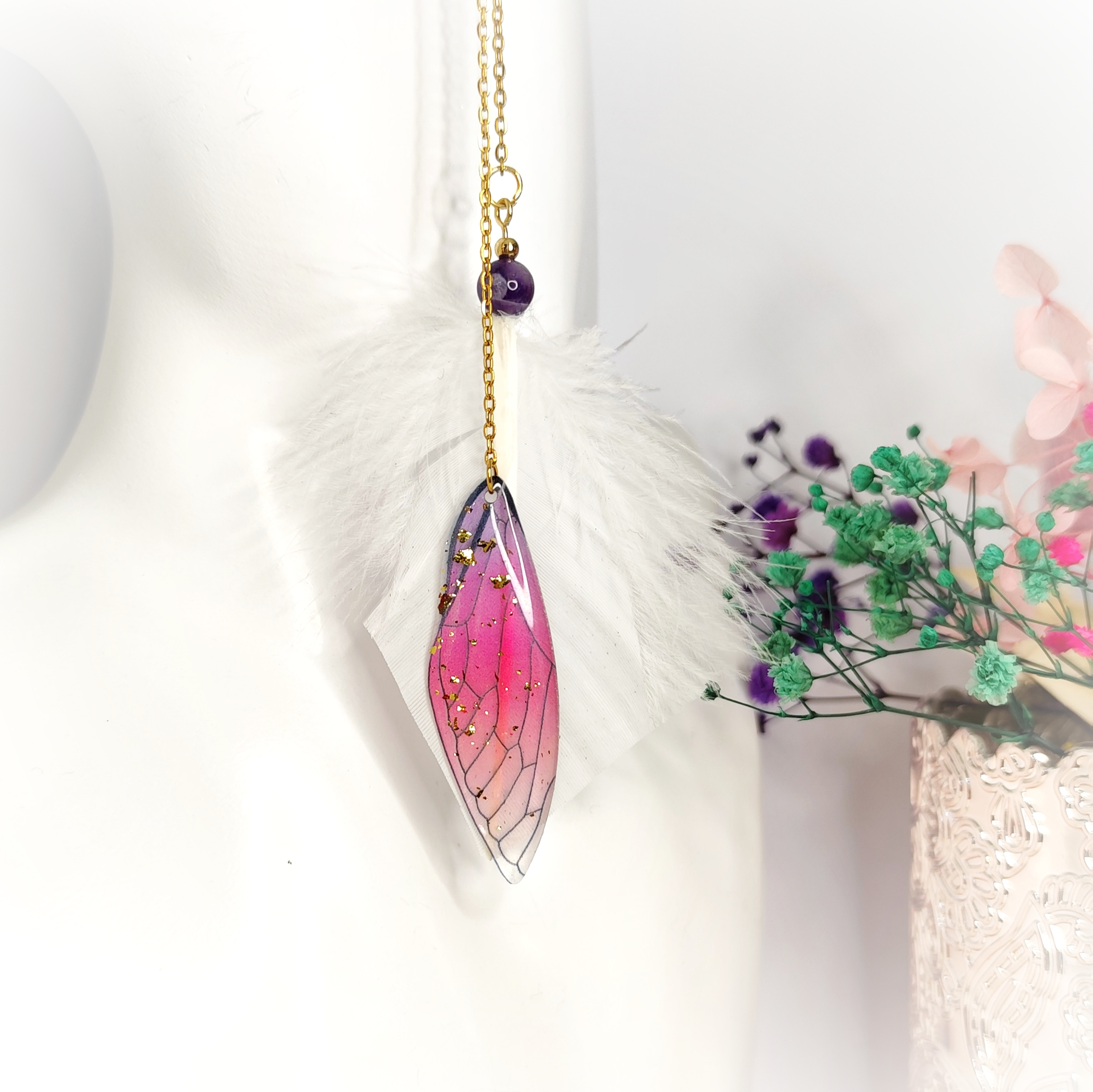 Boucle d'oreille plume et aile de fée